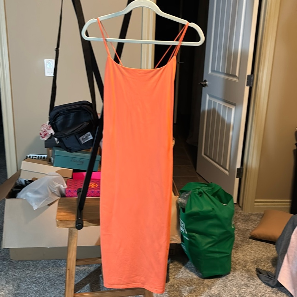 Item # D81 - Babaton Orange crisscross back fitted dress